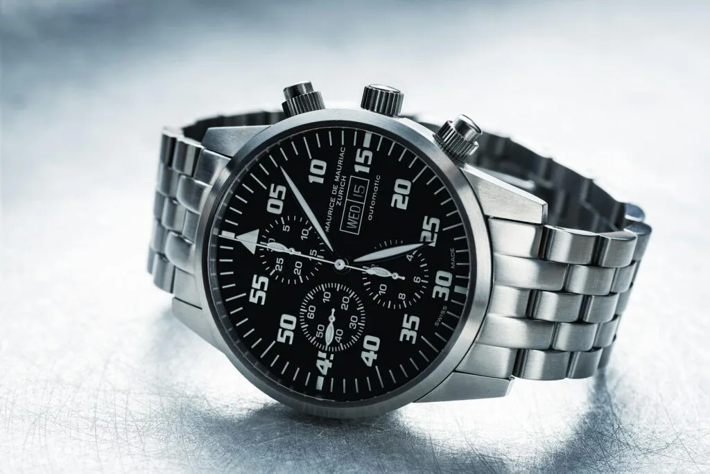 Automatic Watch. Close-up shot of a sleek stainless steel chronograph watch with black dial.