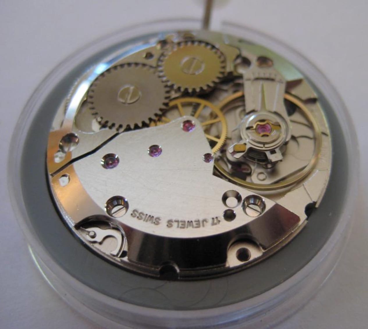 ETA mechanical watch movement showing gear train and balance wheel