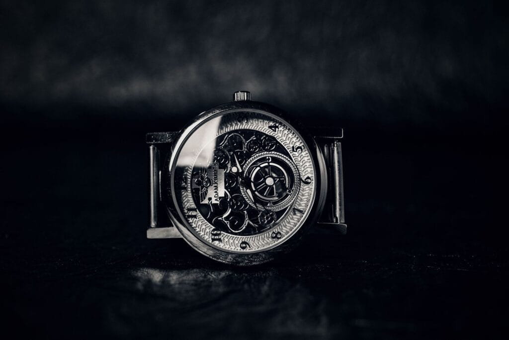 Close-up of a mechanical skeleton wristwatch showing its movement